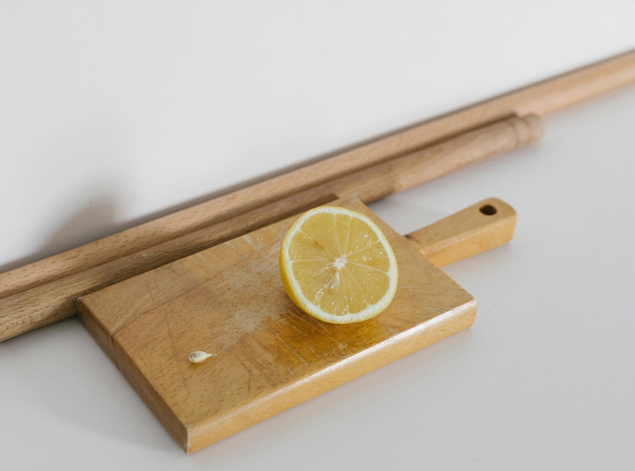 A wooden chopping board in a kitchen setting